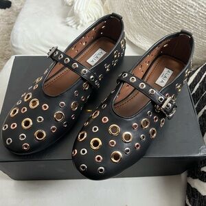 Designer eyelet flats